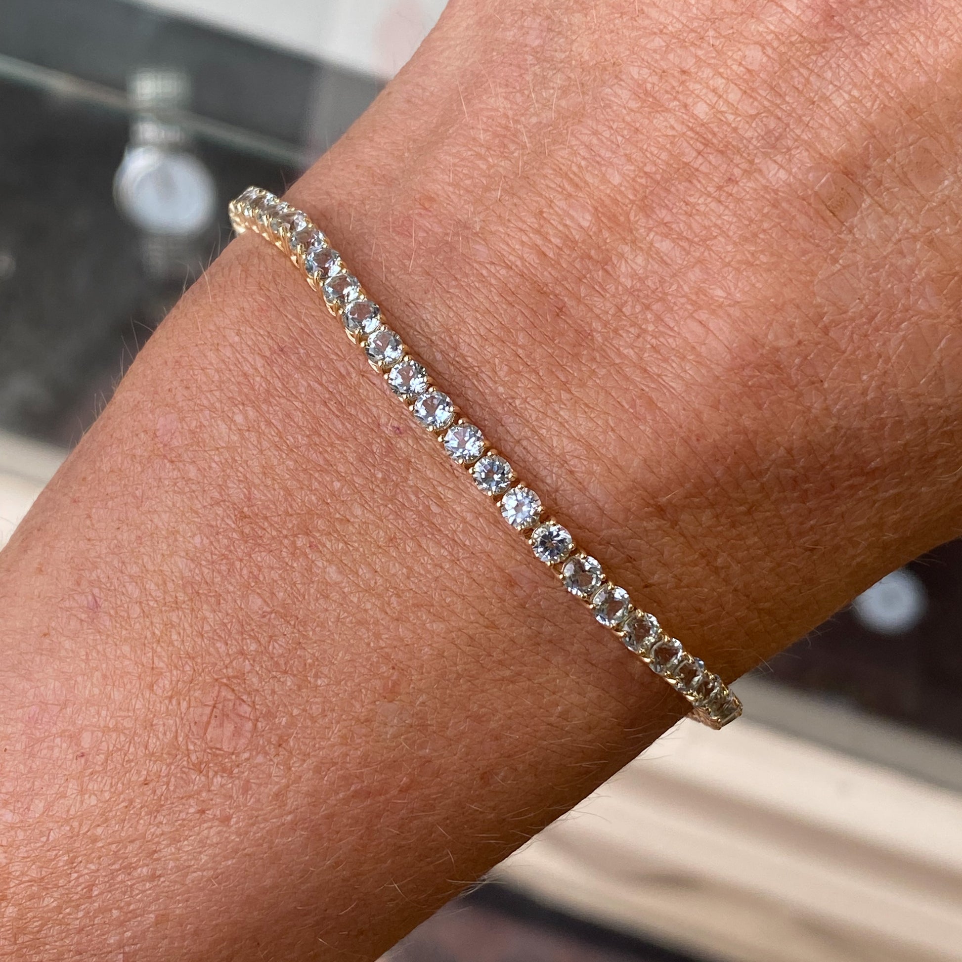 9ct Gold Claw Set Line Bracelet | Sky Blue Topaz - John Ross Jewellers