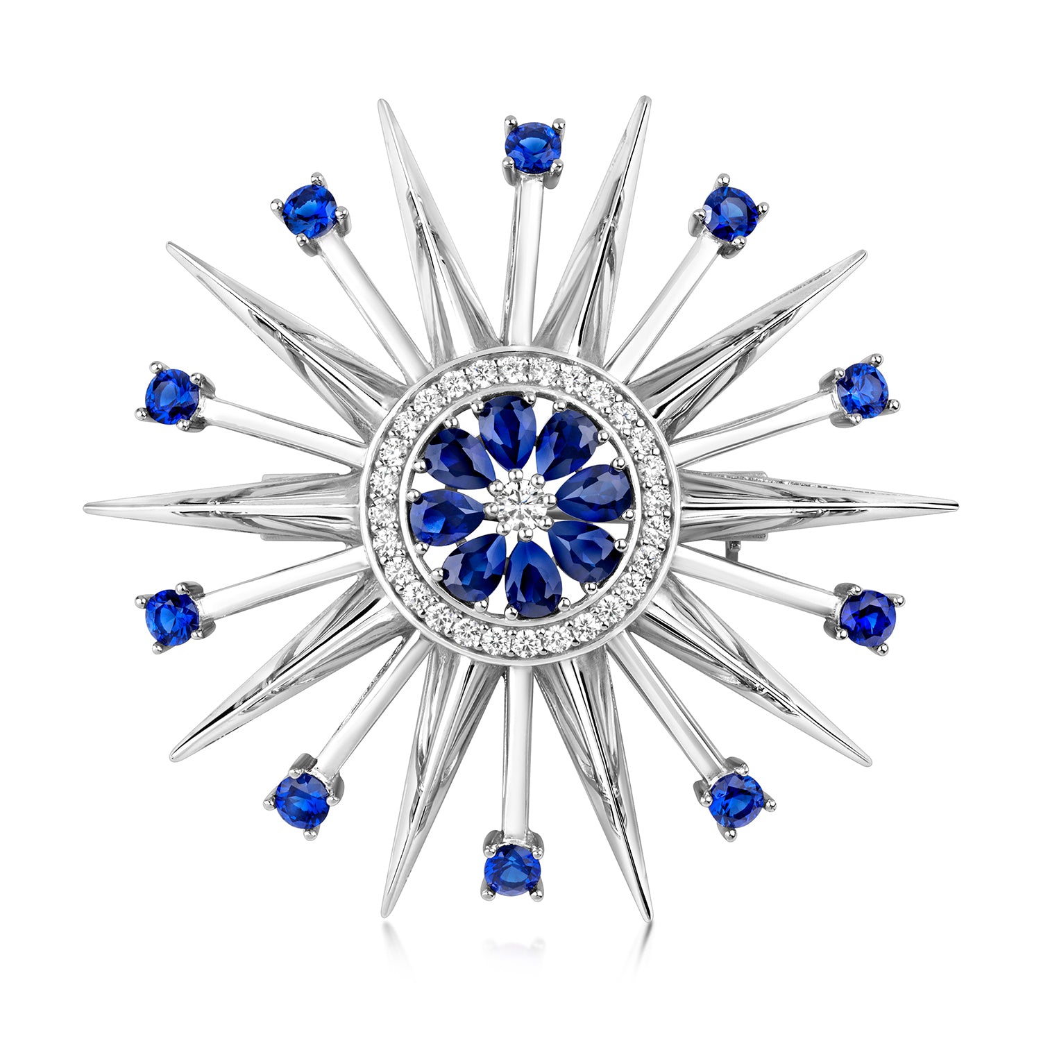 Silver sapphire blue CZ star burst brooch by THC featuring sparkling gemstone accents and intricate metalwork design.