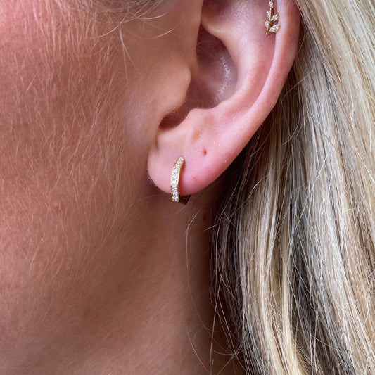 Mark Milton 9ct gold diamond hexagonal huggie hoop earrings, 0.14ct stones viewed from the front