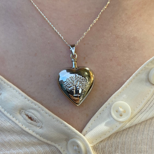 Insignia silver Tree of Life heart ash locket necklace with intricate tree design on pendant