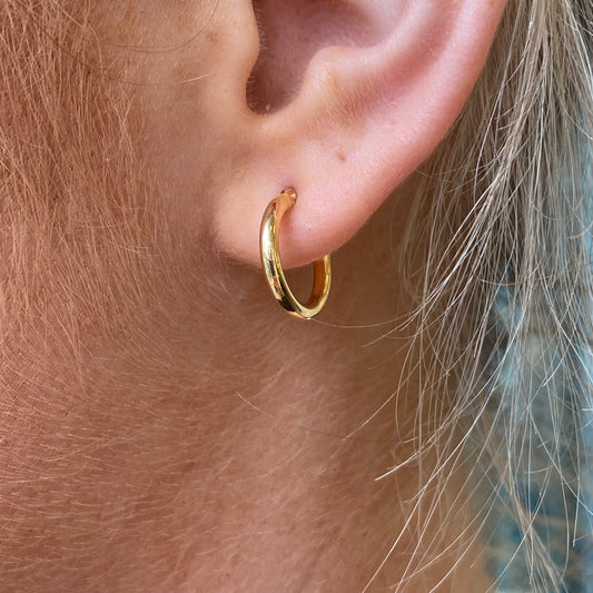 Herbert 18ct gold classic tube hoop earrings, 14mm, shown against a plain background