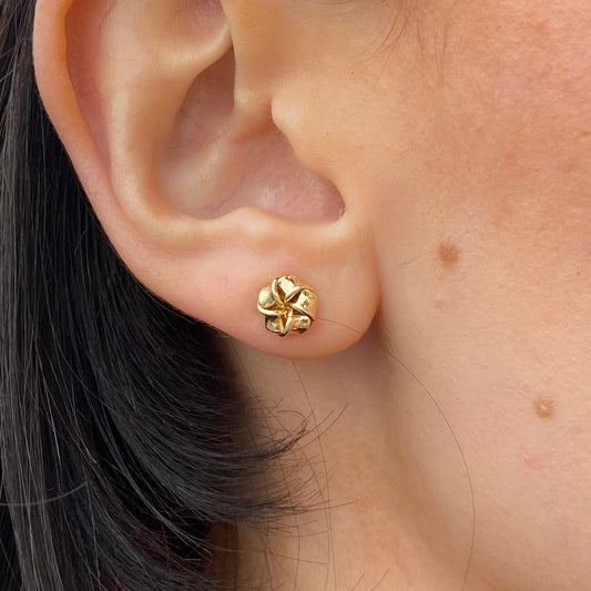 Stubbs 9ct knot stud earring in a classic twisted knot design, shown close up