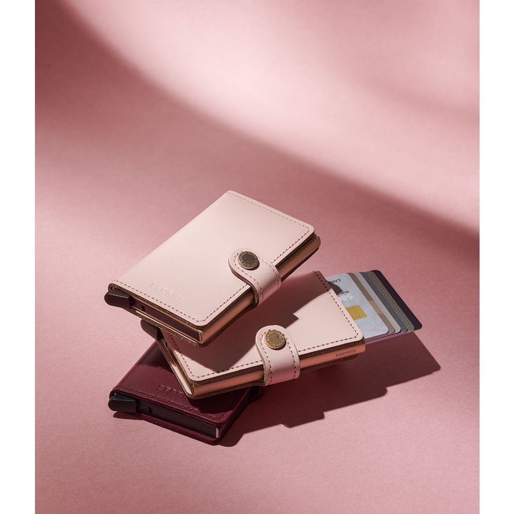 Secrid Miniwallet Original Ballet in soft pink, showing compact leather wallet with card slots and sleek design.