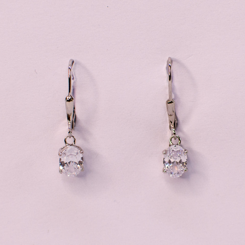 Silver oval CZ drop earrings with German wires from Insignia, featuring sparkling cubic zirconia stones and elegant design.
