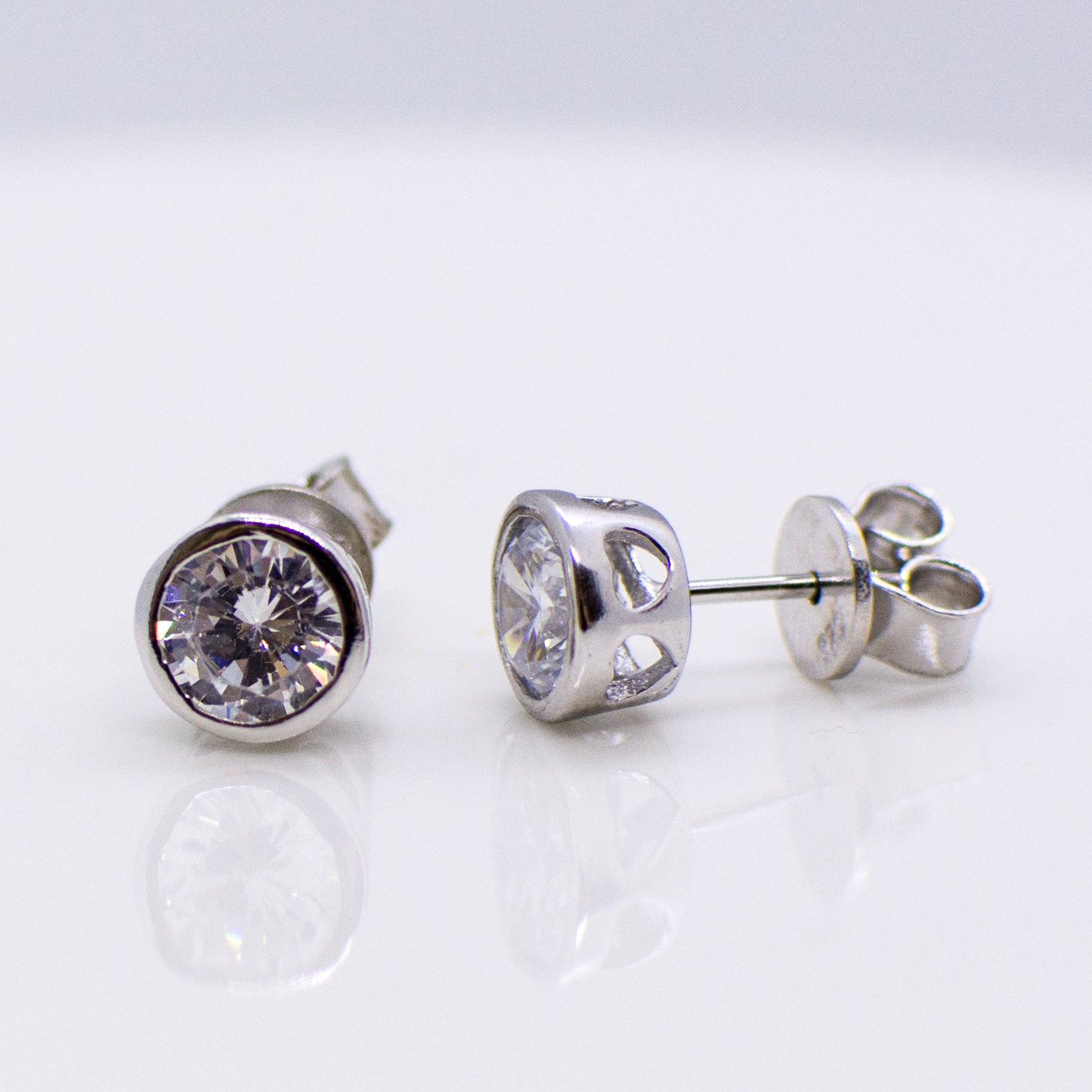 Silver 6mm CZ Stud Earrings with Heart Bezel - John Ross Jewellers