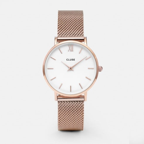 The Classic and timeless Minuit CLUSE - a vibrant rose gold mesh strap with a clear white dial. With a 33mm case and 16mm strap, this is the happy-medium sized watch in the CLUSE range. Warmth and luxe come to mind when admiring this classic feminine piece. 