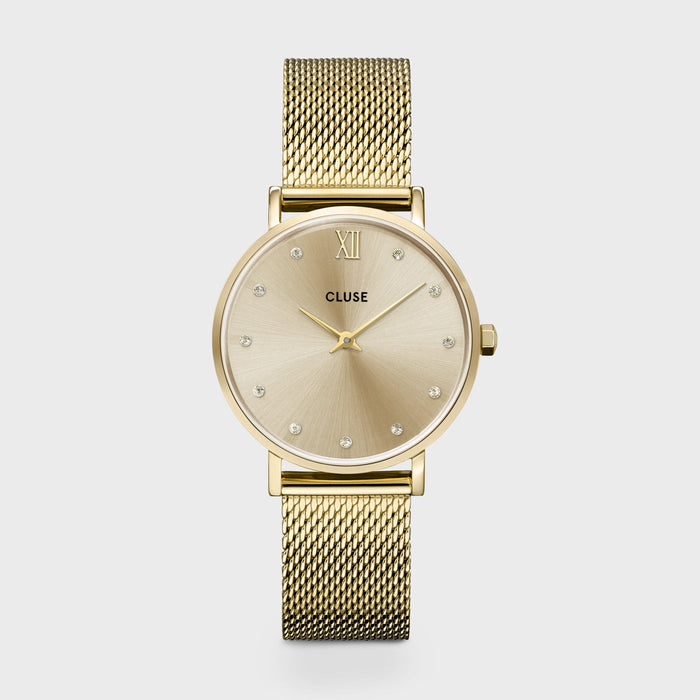 Looking for that bit of sparkle to finish up your look? Look no further. This Minuit watch for women will be your new favourite sparkling accessory. Designed with a champagne sunray dial, set with soft yellow crystals, a polished gold 33 mm round case and a gold mesh 16 mm strap. It’s the perfect watch to finish up your look. And you can easily adjust the strap by yourself. 