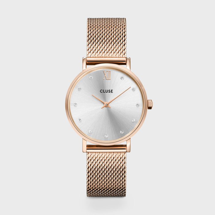 Looking for that bit of sparkle to finish up your look? Look no further. This Minuit watch for women will be your new favourite sparkling accessory. Designed with a silver sunray dial set with crystals, a polished rose gold round 33 mm case and a rose gold mesh 16 mm strap. It’s the perfect watch to finish up your look. And you can easily adjust the strap by yourself. 