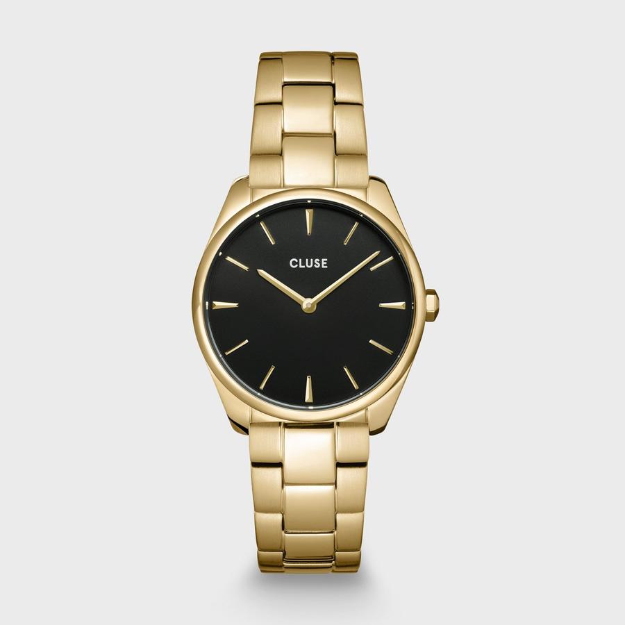 We blended sophisticated minimalism with effortless elegance. This Féroce Petite Steel watch for women in black colour is the flawless accessory for every modern woman who wants to be in Vogue. Its contemporary style is instantly reflected in stainless steel rounded 31,5 mm case in gold colour and a minimalistic brass black dial. Thanks to its gold coloured 16 mm strap, this dazzling beauty will suit every wrist and every outfit. Shine throughout the day with this classic timepiece.