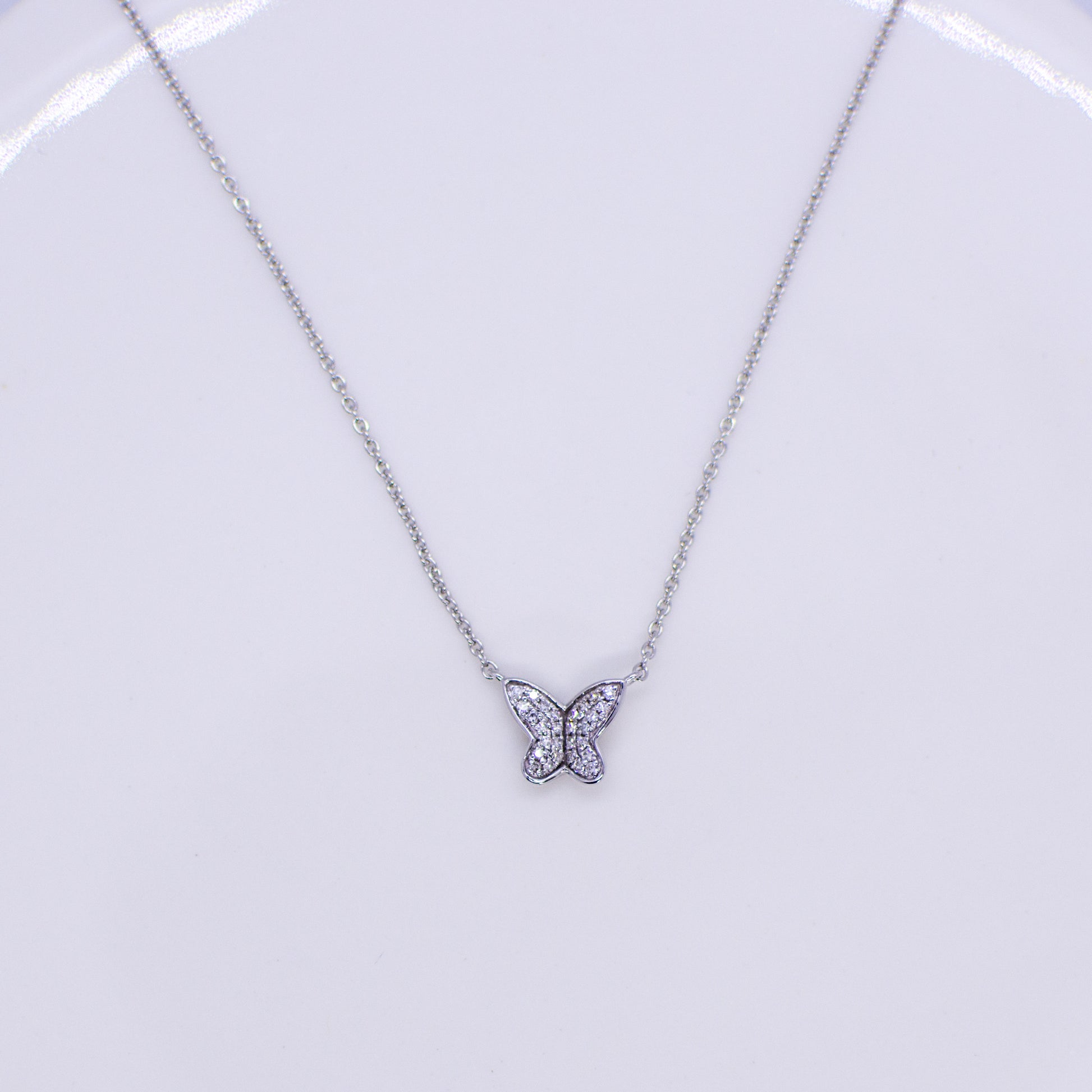 Such a darling necklace, this would be a truly unique gift.  This pretty butterfly has sparkling diamond set wings.  0.08ct in total approximately.  9ct white gold.  The butterfly is integrated in to the 39-44cm adjustable 9ct white gold fine trace chain with lobster clasp.