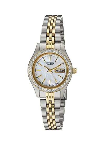 Design and comfort unite in the Citizen collection, offering timepieces with universal appeal. Key features of this 3-hand analog watch in stainless steel with gold tone include day-date indicator, mother of pearl dial, bezel set with crystals, 26mm case and 50 metre water resistance.
