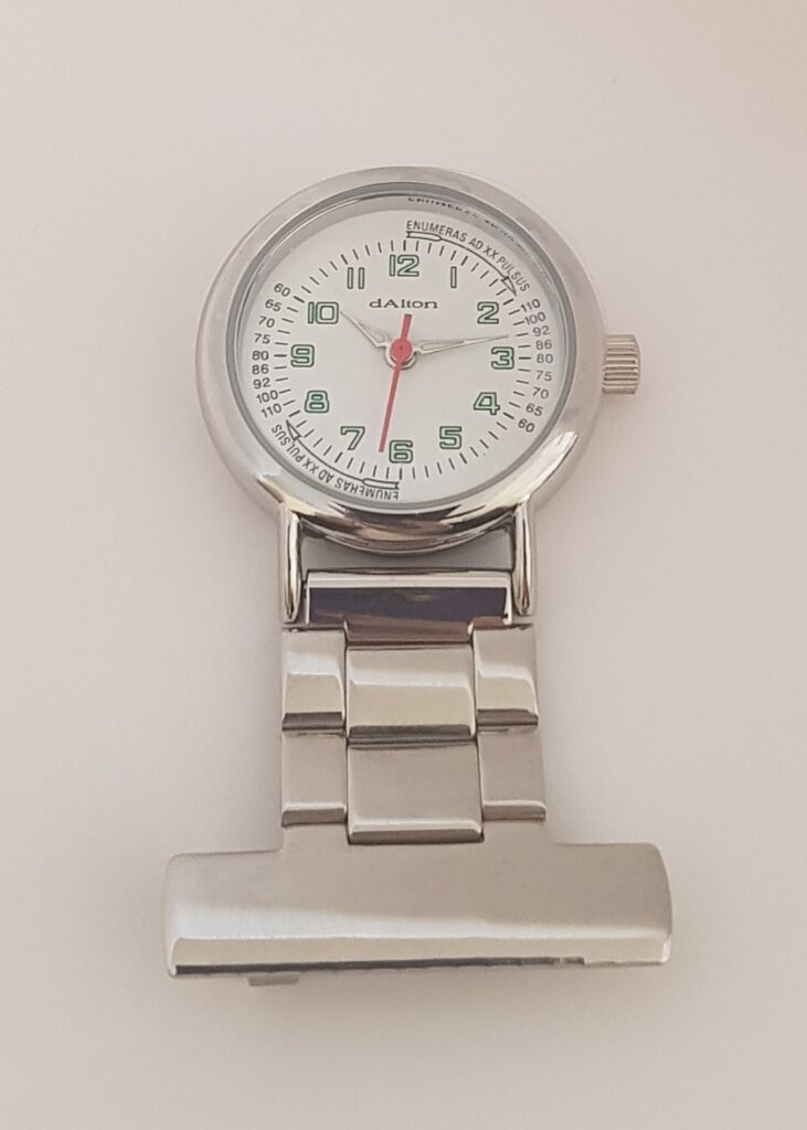 Q&Q Nurse's Fob Watch with clear dial and metal clip, designed for medical professionals to easily check time during shifts.