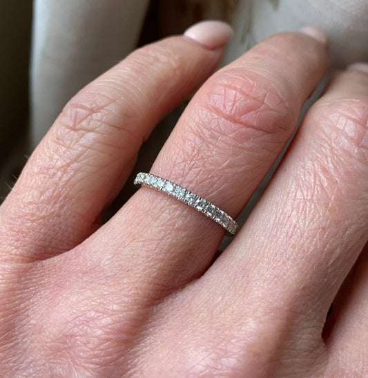 18ct white gold diamond eternity ring set with fifteen round brilliant cut diamonds. 0.31ct in total. G colour. VS clarity. 2mm diameter . This ring is suitable as a wedding band or eternity ring. Size M Other sizes by special order.