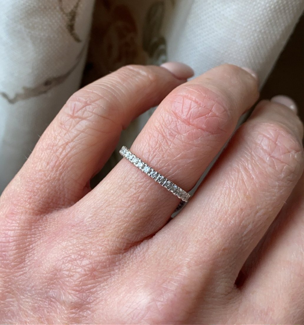 18ct white gold diamond eternity ring set with fifteen round brilliant cut diamonds. 0.26ct in total. G colour. VS clarity. 2mm diameter . This ring is suitable as a wedding band or eternity ring. Size N Other sizes by special order.