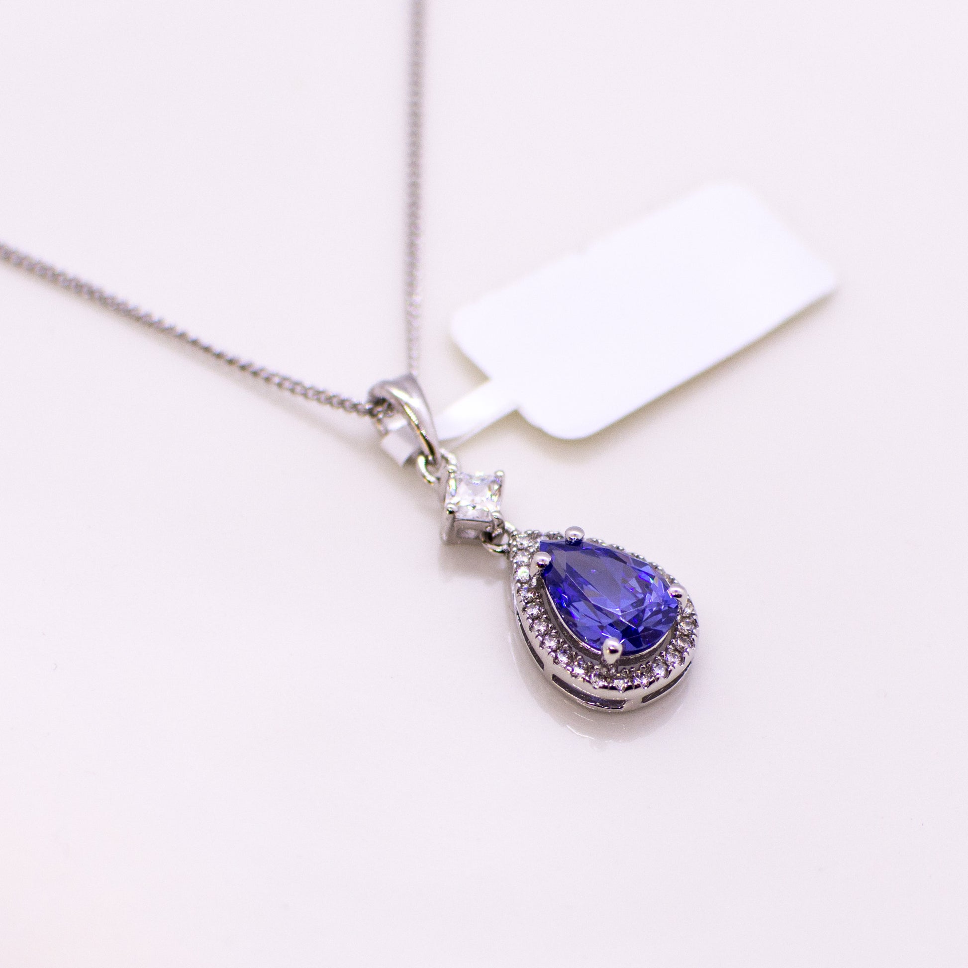 Silver Created Tanzanite & CZ Pear Halo Pendant Necklace - John Ross Jewellers
