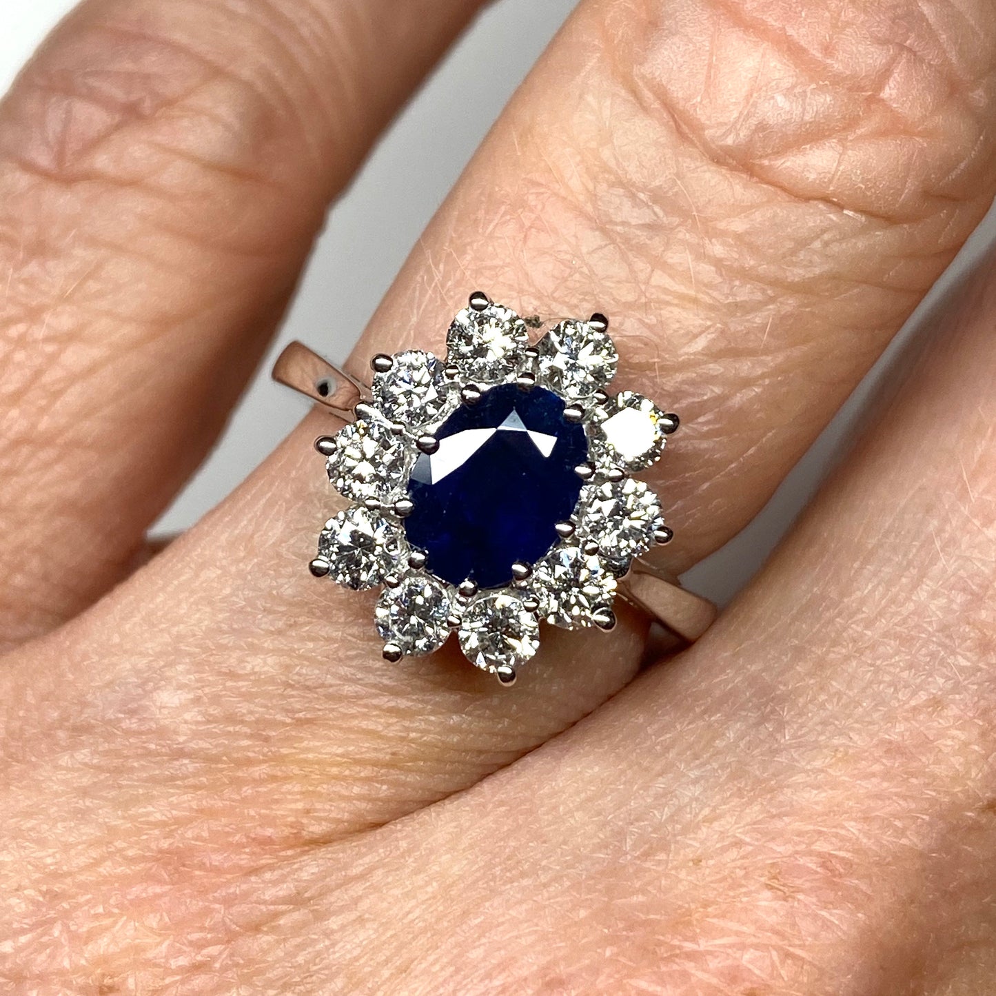 Inspired by Princess Diana’s iconic engagement, this oval sapphire and diamond ring is a classic design for any occasion.  18ct White Gold  1.25ct Sapphire  1.00ct of Diamonds