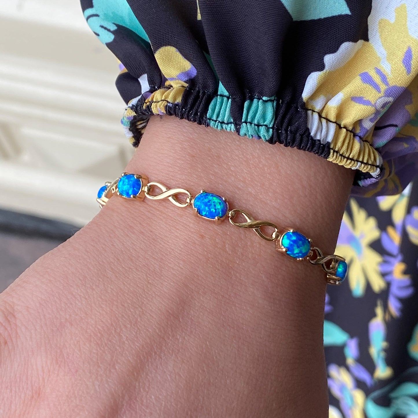9ct Gold Blue Opalique Infinity Bracelet - John Ross Jewellers