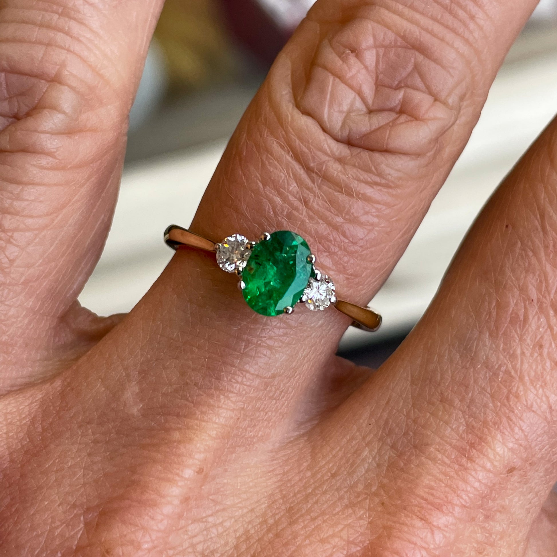 18ct Yellow Gold Emerald & Diamond Engagement Ring | 0.64ct Oval cut Emerald  + 0.23ct of round brilliant cut diamonds   Size O