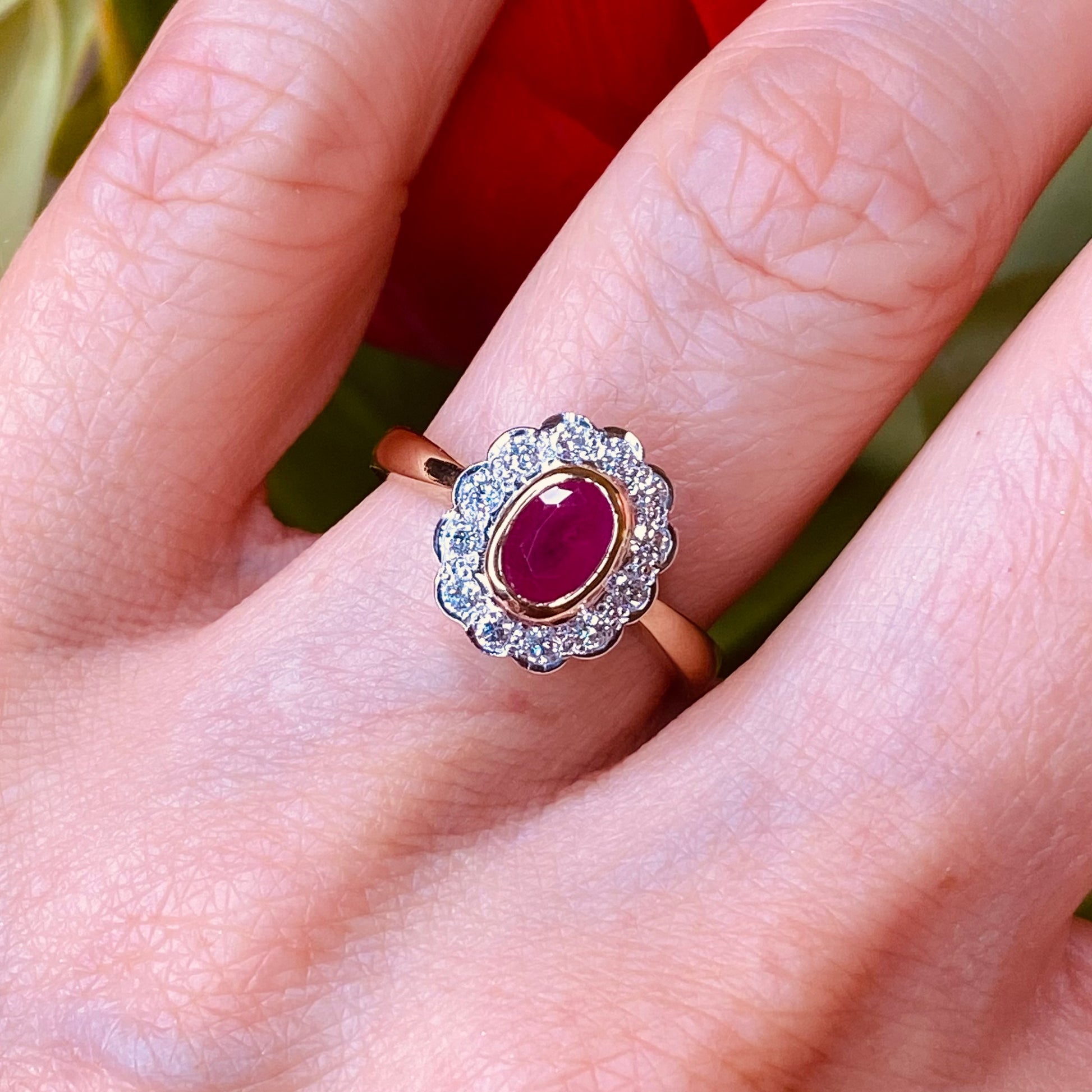 9ct Gold Ruby & Diamond Cluster Ring  Natural Oval Cut Ruby  0.30ct of round brilliant cut diamonds  Size O