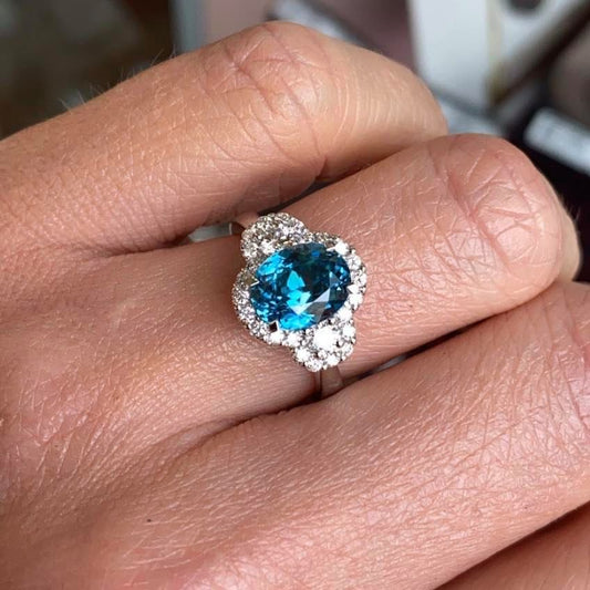 18ct White Gold Blue Zircon & Diamond Ring Size M 1/2 Blue zircon 3.93ct Diamonds 0.24ct in total