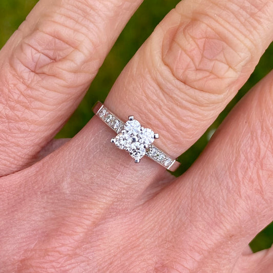 18ct White Gold 0.42ct Diamond Quattro Engagement Ring  A Quattro of round brilliant cut diamonds with claw set diamond shoulders with millgrain finish. 0.42ct of round brilliant cut diamonds in total. This ring is handmade in Ireland. Band size N.
