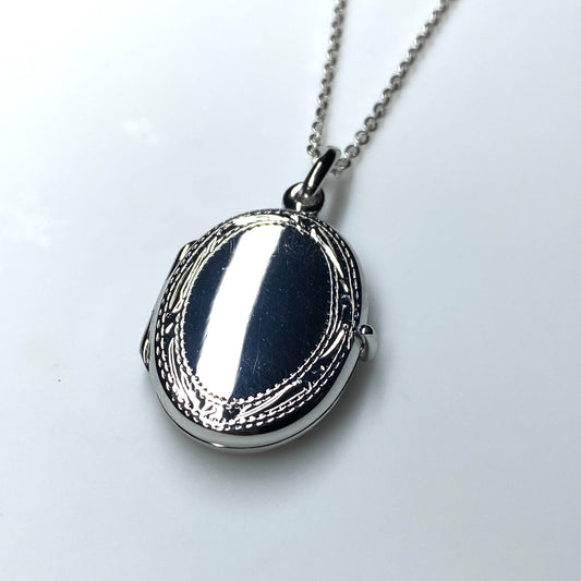 Silver Oval Locket With Engraved Border - John Ross Jewellers