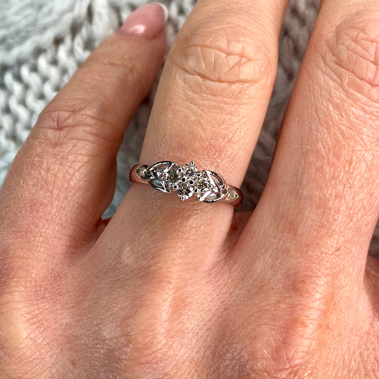 9ct White Gold Trinity Knot Cluster Diamond Engagement Ring 0.25Ct H SI  A boat shaped cluster of four diamonds with beautiful Trinity Knot shoulders for a twist of Celtic flair.  Size N  Made in Ireland