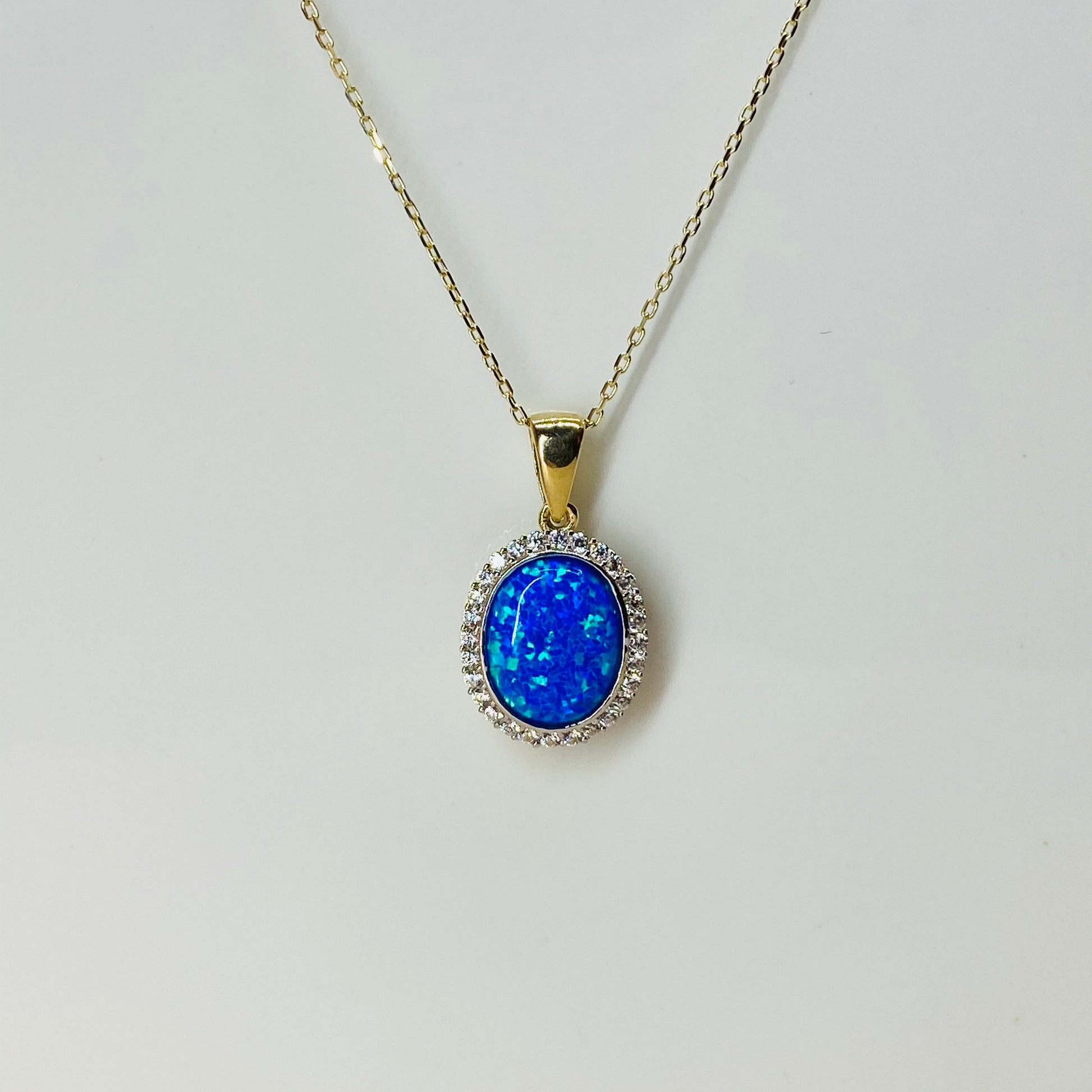 9ct Gold Oval Blue Opalique CZ Halo Necklace - John Ross Jewellers