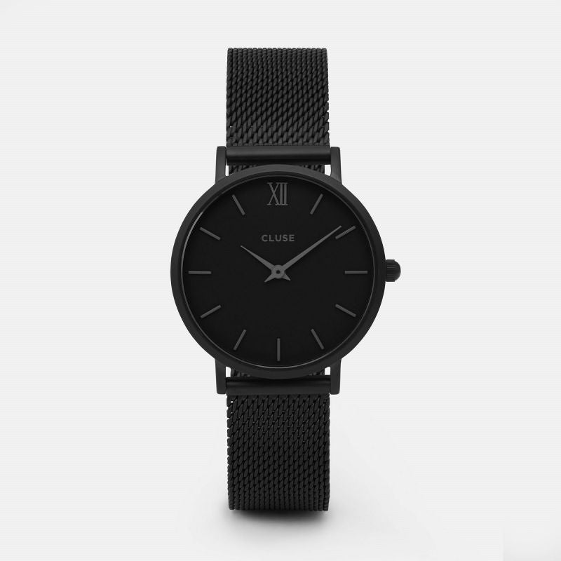 Be bold with this Black on Black look! The delicate design of this watch makes it a featherlight wear and the perfect accessory with a  subtle result. The watch features a 33mm case, where black is paired with black details to create a minimalist timepiece. Change it up with other straps to personalise it in the future. The watch comes in a beautiful leatherette pouch.